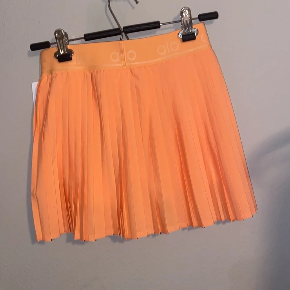 NWT ALO Aces pleated Tennis Skirt size small - cantaloupe
